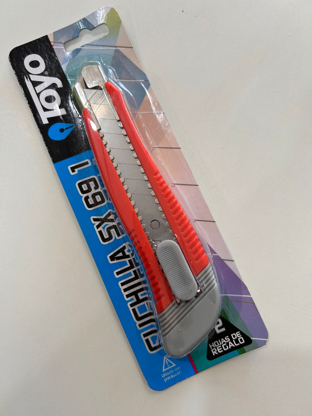 Imagen ilustrativa de Cutter Toyo SX69 1 c/guia metal blister